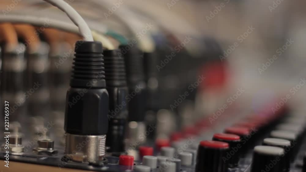 Extreme close up XLR inputs on a sound board