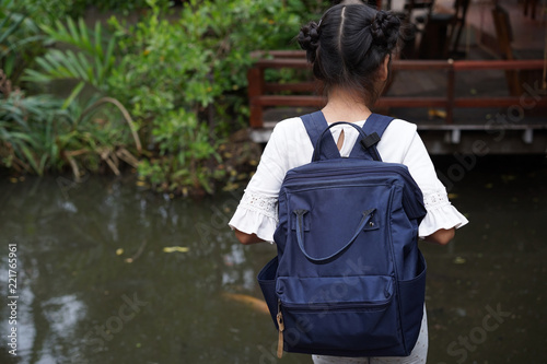 Asian girl Kids travel backpack