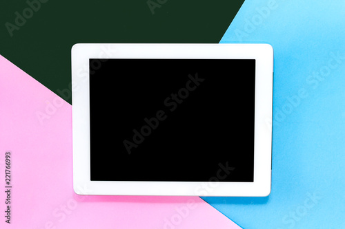 Free Download Top view of mockup digital tablet with blank screen on blue and pink pastel background.technology and communication concept.Flat lay - GFXLoad