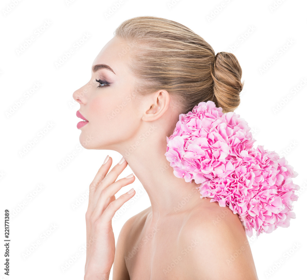 Young woman touches neck by fingers