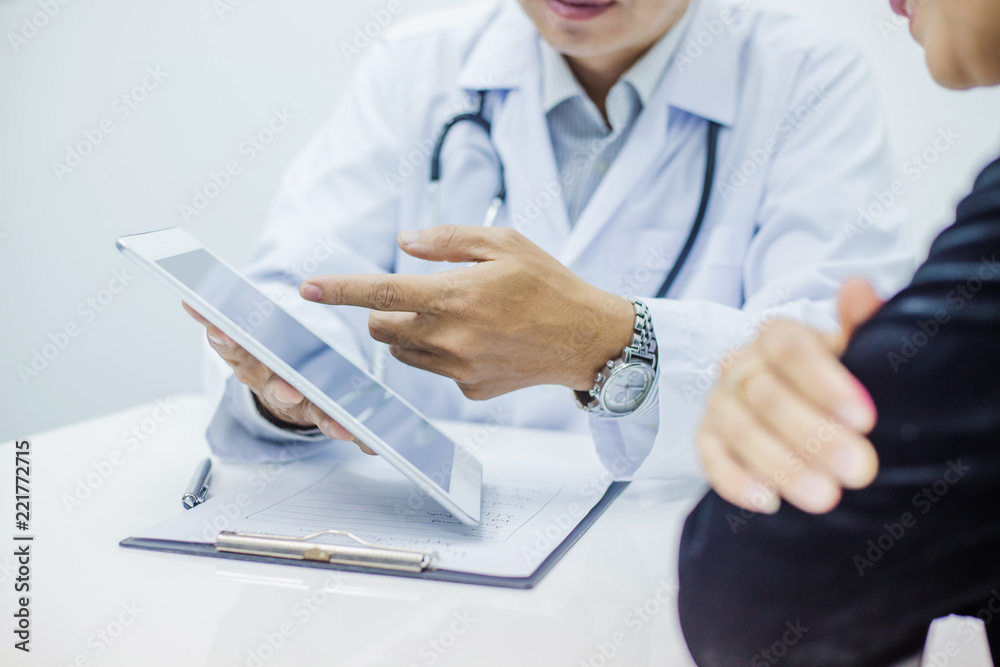 Doctor consultation with the patient by using digital tablet Doctor consultation with the patient by using digital tablet