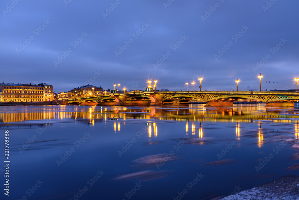 View of Annunciation Bridge and Admiralty embankment at night. Saint Petersburg. Russia