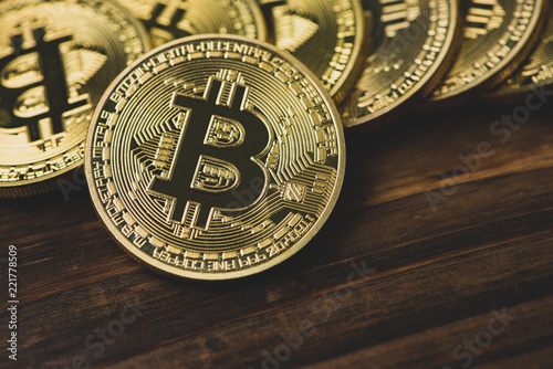 Bitcoin on wood background