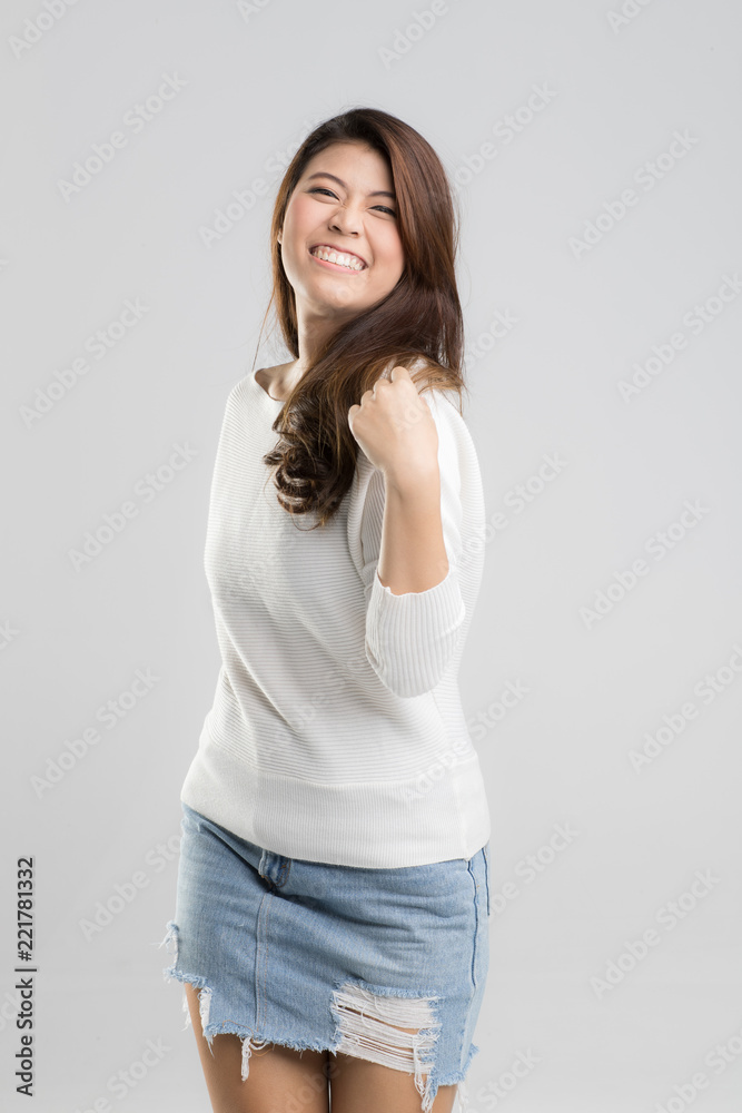 Portrait of young beautiful Asian girl pose to camera. Original details on skin with very little retouch. Portrait of young beautiful Asian girl pose to camera. Original details on skin with very little retouch.
