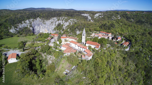 The Skocjan Caves / Skocjanske jame / Grotte di Skocjan is the largest cave in Europe on UNESCO list. The enterance is a huge collapse sinhole / doline below the church of St. Canzian (Kancijan)  photo