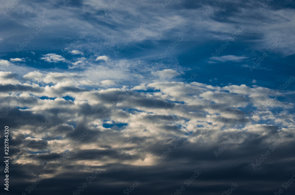 Dramatic sunset sky with colorful clouds after thunderstorm