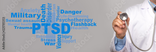 Health Care Concept. Doctor holding a stethoscope and PTSD - post traumatic stress disorder words on gray background. War veteran mental health issue.