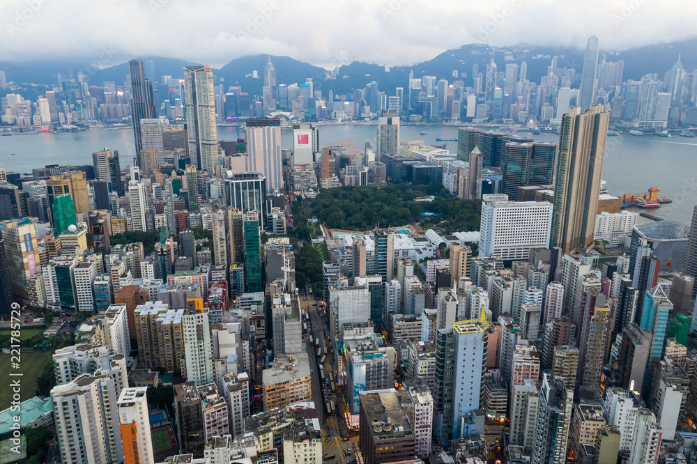 Fototapeta premium Aerial view of Hong Kong skyline with sun flare