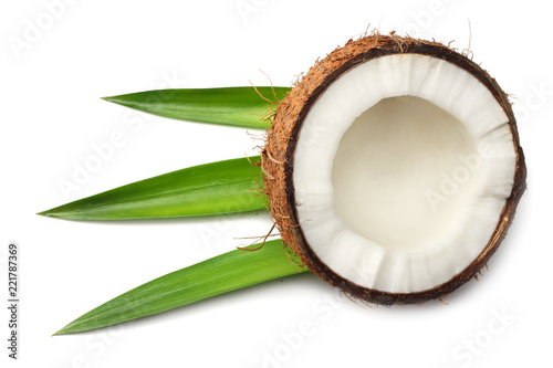 Coconut with green leaves isolated on white background. top view