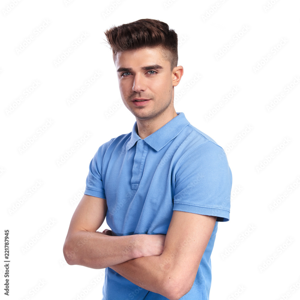 portrait of a confident casual man with hands crossed portrait of a confident casual man with hands crossed
