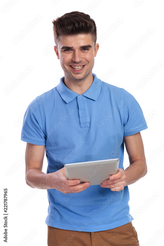 young casual man with a tablet pad computer young casual man with a tablet pad computer