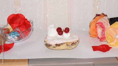 cake with hearts and flowers on white background