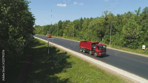 Wallpaper Mural motion over modern road with driving tipper truck top view Torontodigital.ca
