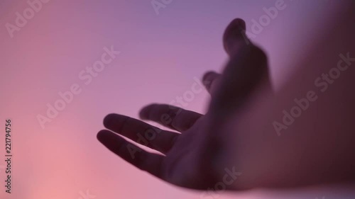 slow-motion of right hand reach beautiful vanilla sky, shallow depth of field 