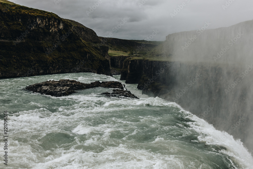 scenic view of steam above beautiful Gullfoss waterfall in Iceland