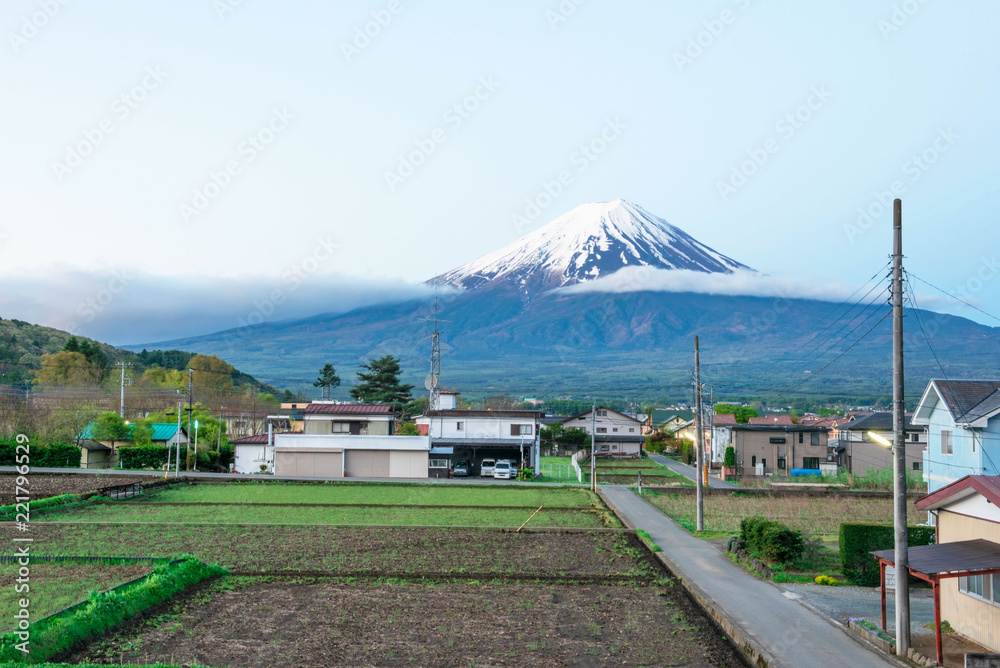 Fototapeta premium Mountain fuji and clouds at kawaguchi at morning in autumn view behind Kawaguchiko village yamanachi in Japan .