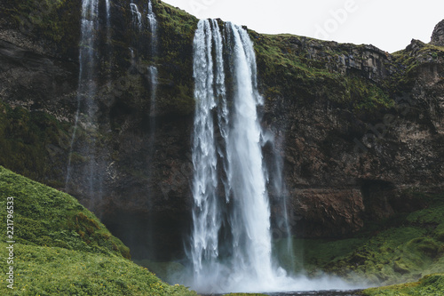 scenic view of beautiful Seljalandsfoss waterfall in highlands in Iceland