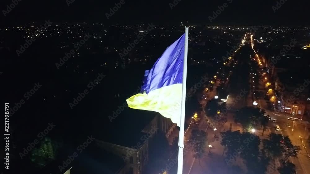 Parallax shooting of the biggest flag of Ukraine, the evening city Parallax shooting of the biggest flag of Ukraine, the evening city