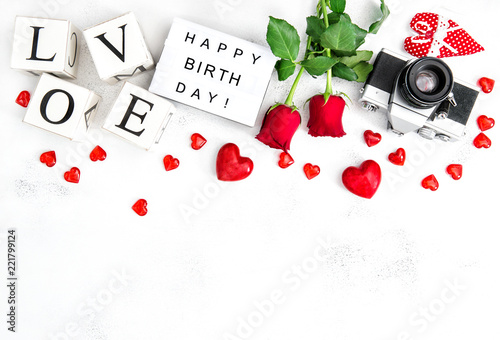 Rose flowers red hearts decoration photo camera Birthday card