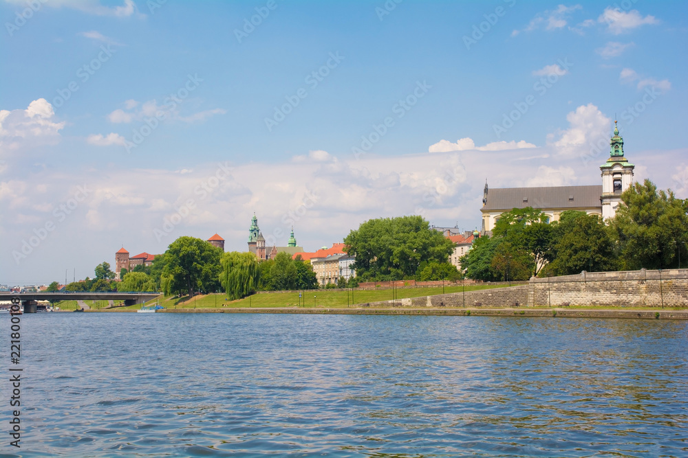 The historic Church on the Rock, also called Skalka, the Pauline Church and St Stanislaw's church, on the banks of the river Vistula in Krakow, Poland. Wawel Cathedral & Castle are in the background
