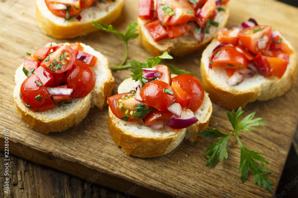 Tomato bruschetta with red onion and parsley Tomato bruschetta with red onion and parsley
