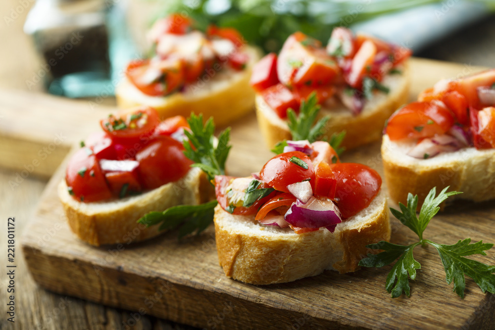 Tomato bruschetta with red onion and parsley