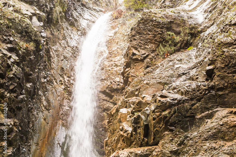Naklejka premium Autumn landscape with a waterfall in Troodos, Cyprus