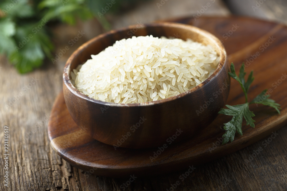 White rice in the wooden bowl