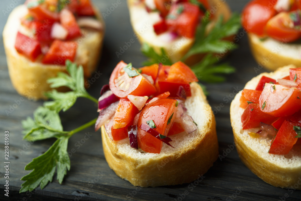 Tomato bruschetta with red onion and parsley