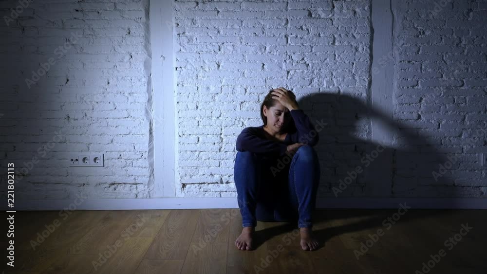Young devastated depressed woman crying sad feeling hurt suffering depression in sadness emotion in pain and desperate expression. loneliness, depression and heartbroken concept Young devastated depressed woman crying sad feeling hurt suffering depression in sadness emotion in pain and desperate expression. loneliness, depression and heartbroken concept