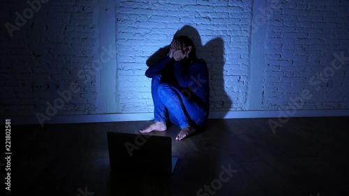 Woman suffering Internet cyber bullying