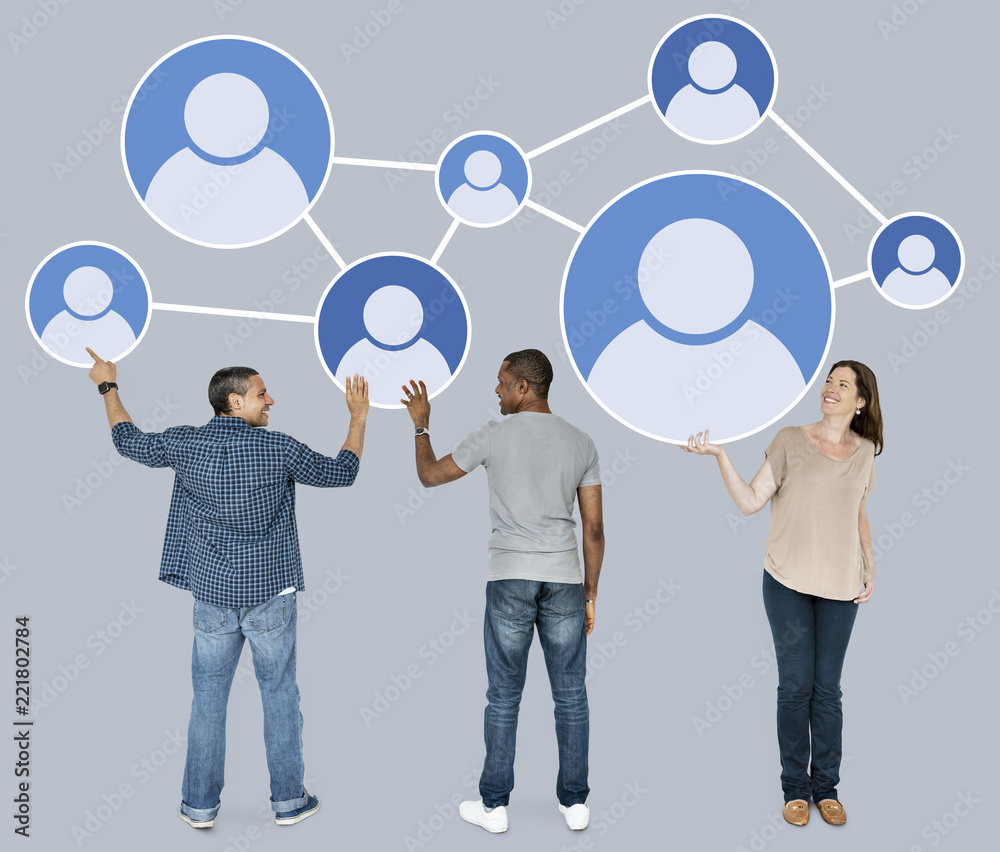 Diverse people holding networking icon Diverse people holding networking icon