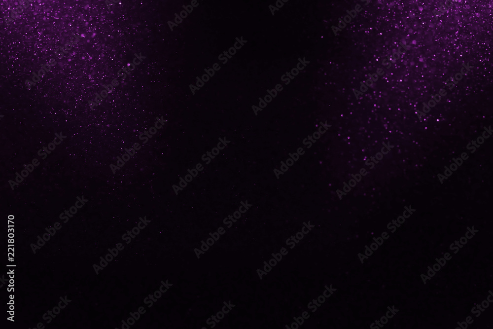 purple and black glitter vintage lights background. defocused.