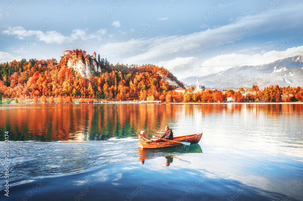 Lake Bled in Slovenia. Romantic scenery and captivating seasonal autumn  landscape, forest with yellow leaves and old castle on hill. Famous and  popular landmark. Stock Photo | Adobe Stock