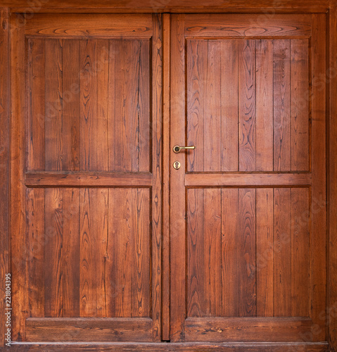 Wooden double door with vertical boards