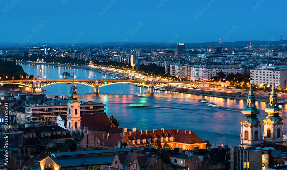 Budapest cityscape over Danube river at blue hour