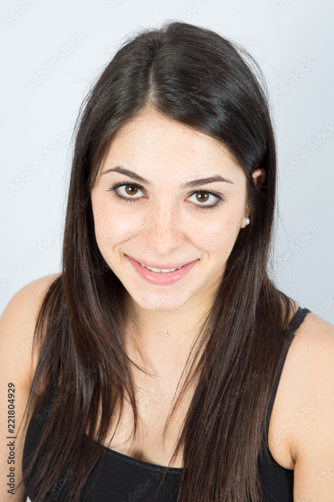 Portrait of a happy young woman brunette girl on white Portrait of a happy young woman brunette girl on white