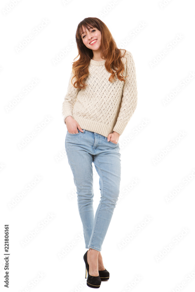 Full body smiling young woman against isolated white background Full body smiling young woman against isolated white background