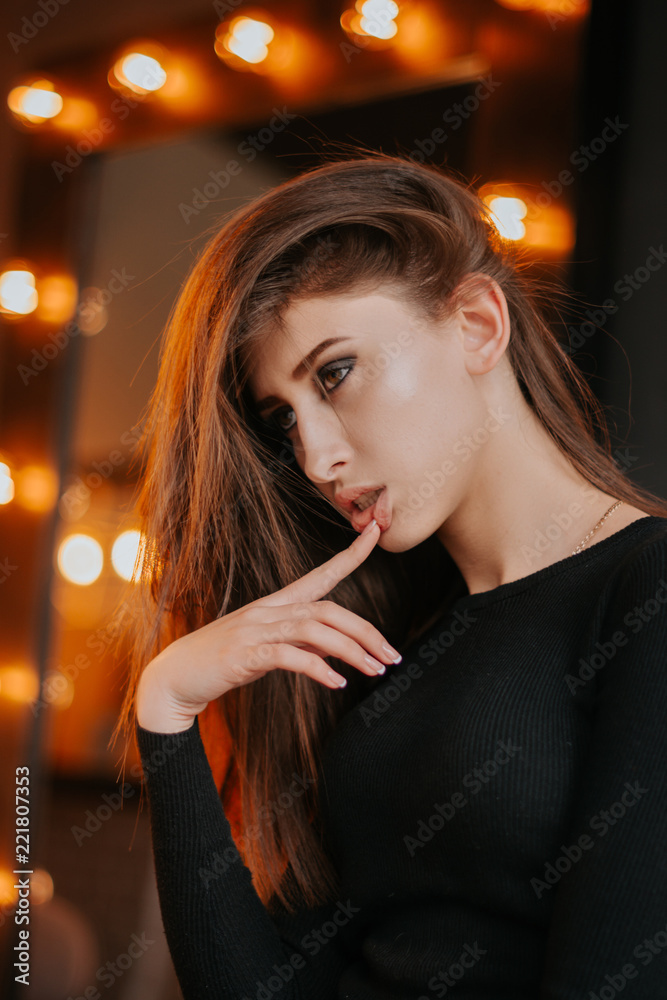 Fototapeta premium Pretty Girl. Brunette. Makeup. Studio.Light. Flashlights.