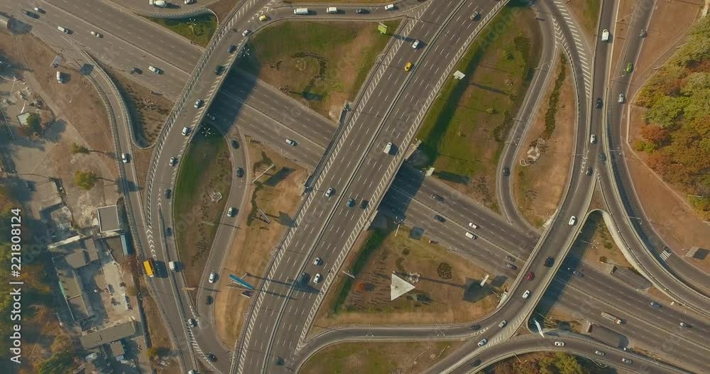 Aerial view of a turbine road interchange in Kiev. Cityscape in summer. 4K