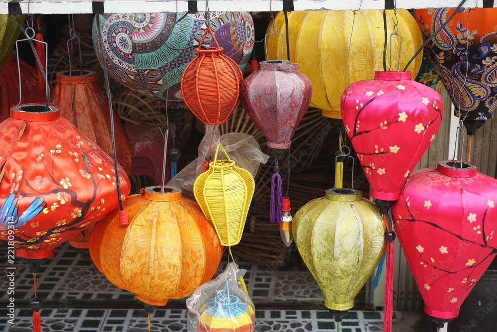 Colorful silk lanterns for sale at a market in Hoi An Vietnam