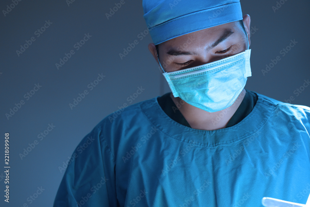 veterinarian surgery in operation room take with art lighting and blue filter veterinarian surgery in operation room take with art lighting and blue filter
