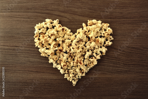 Concept of loving the cinema with vintage popcorn heart