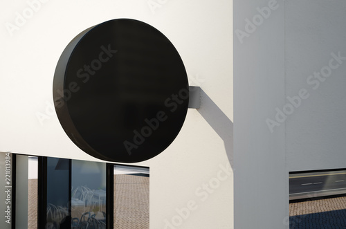 mockup of a rounded sign on exterior wall photo