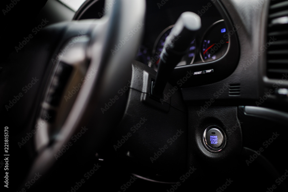 Detail on the start button in a car. Car interior, key, start&st