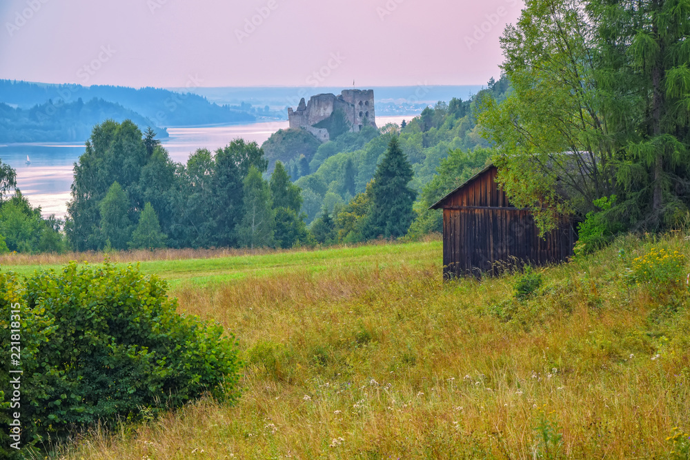 Rural landscape in Pieniny Mountains. Czorsztyn Castle in background. Southern Poland