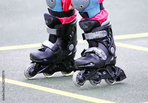 child rollerblading outdoor. sport lifestyle. roller skating photo