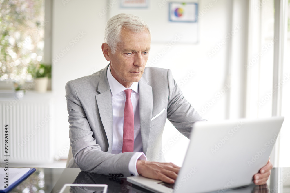 Senior investment advisor businessman at work Senior investment advisor businessman at work