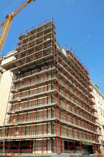 Building facade of the 60s during renovations. Brescia, Italy. © imagosrb