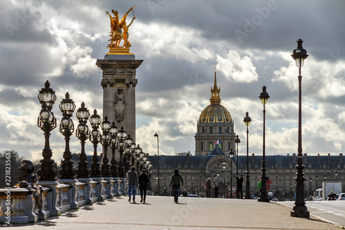 A cloudy day at the Pont Alexandre III and Les Invalides in Paris